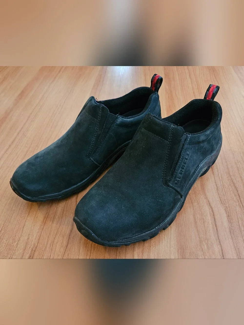 Size 8 Men's Merrell Jungle Moc Black Suede Slip-On Loafers with Red Heel Tabs